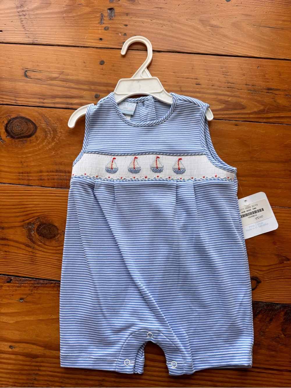 Petit Bebe Blue Stripe Baby Romper with Sailboat Smocking